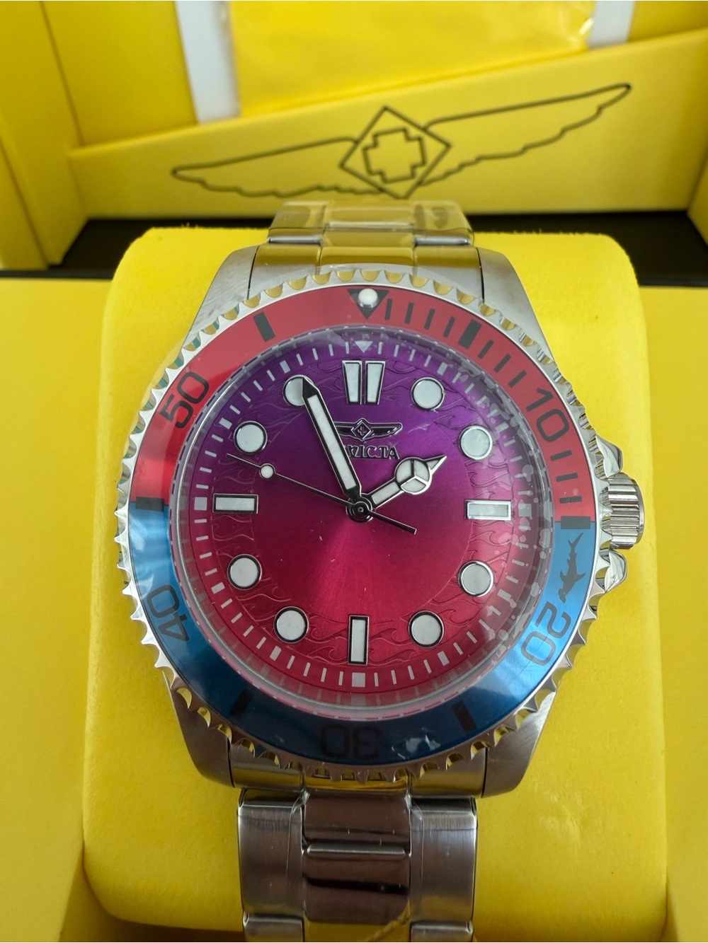 Invicta Men’s Red and blue Diver Watch. Model 50937. New in box.